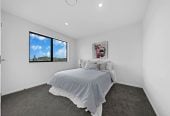 Brandnew 5 beds 4.5 baths house with garage, The ground floor features a private wing with a spacious bedroom, separate bathroom, and its own living area. 13 Star Cross Road, Karaka, Auckland
