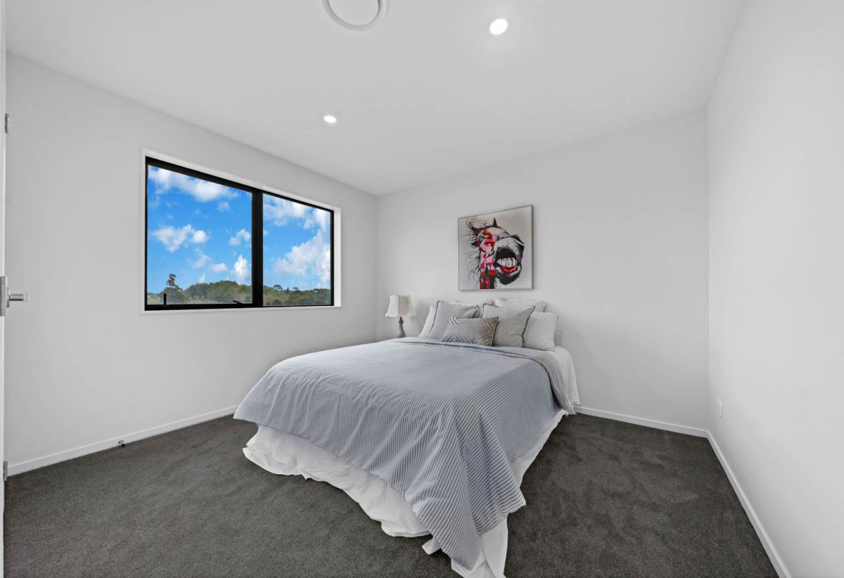 Brandnew 5 beds 4.5 baths house with garage, The ground floor features a private wing with a spacious bedroom, separate bathroom, and its own living area. 13 Star Cross Road, Karaka, Auckland