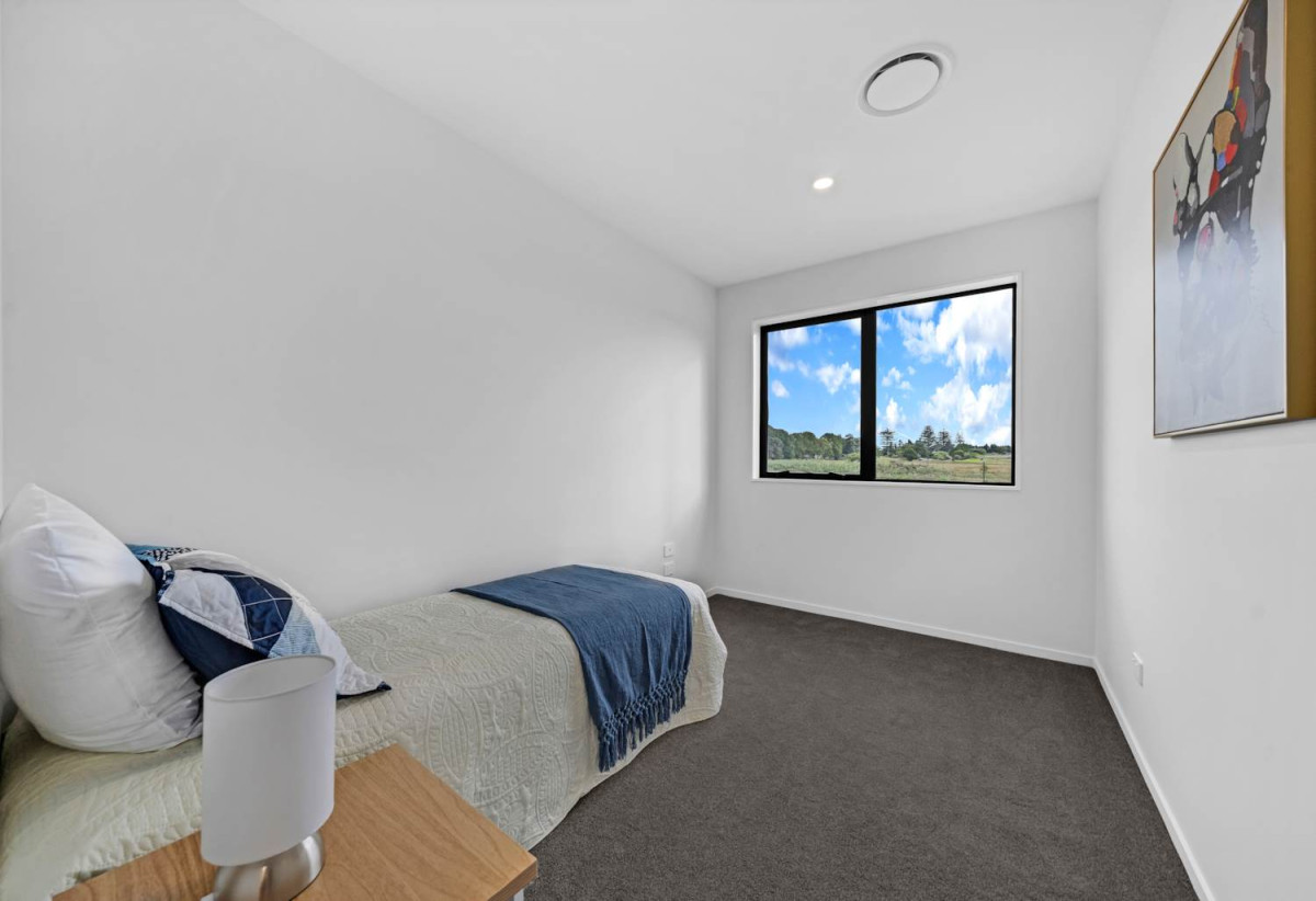 Brandnew 5 beds 4.5 baths house with garage, The ground floor features a private wing with a spacious bedroom, separate bathroom, and its own living area. 13 Star Cross Road, Karaka, Auckland