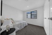 Brandnew 5 beds 4.5 baths house with garage, The ground floor features a private wing with a spacious bedroom, separate bathroom, and its own living area. 13 Star Cross Road, Karaka, Auckland