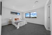 Brandnew 5 beds 4.5 baths house with garage, The ground floor features a private wing with a spacious bedroom, separate bathroom, and its own living area. 13 Star Cross Road, Karaka, Auckland