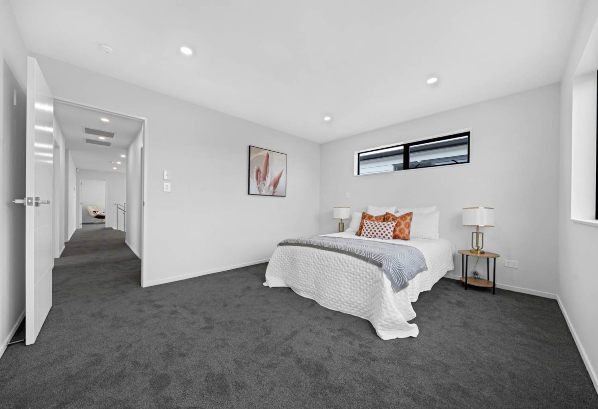 Brandnew 5 beds 4.5 baths house with garage, The ground floor features a private wing with a spacious bedroom, separate bathroom, and its own living area. 13 Star Cross Road, Karaka, Auckland