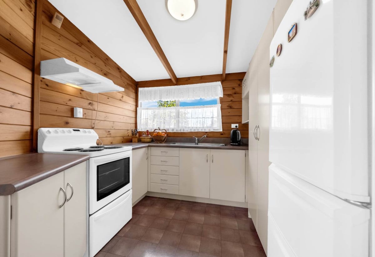 Half share of 1,219m² , 3 beds 1 bath house with Single garage, own separate driveway, extra car park, 2/94 Carruth Road, Papatoetoe, Auckland
