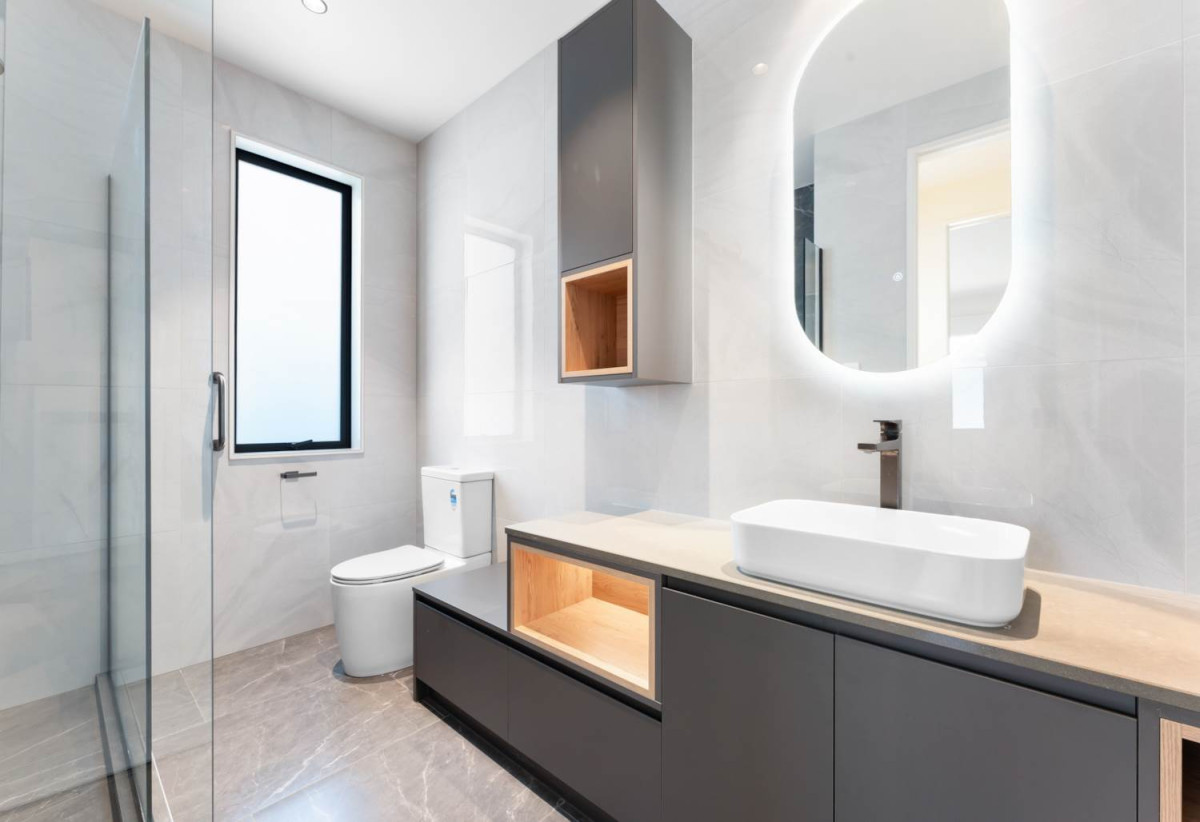 Rangitoto College zone, 502m2 section, 502m2 Floor area, 2 kitchens, 5 beds + 2 office room 4.5 baths house with double garage, Located on the basement level, the private gym is complete with a large mirrored feature wall , 18 Hooten Place, Oteha, Auckland