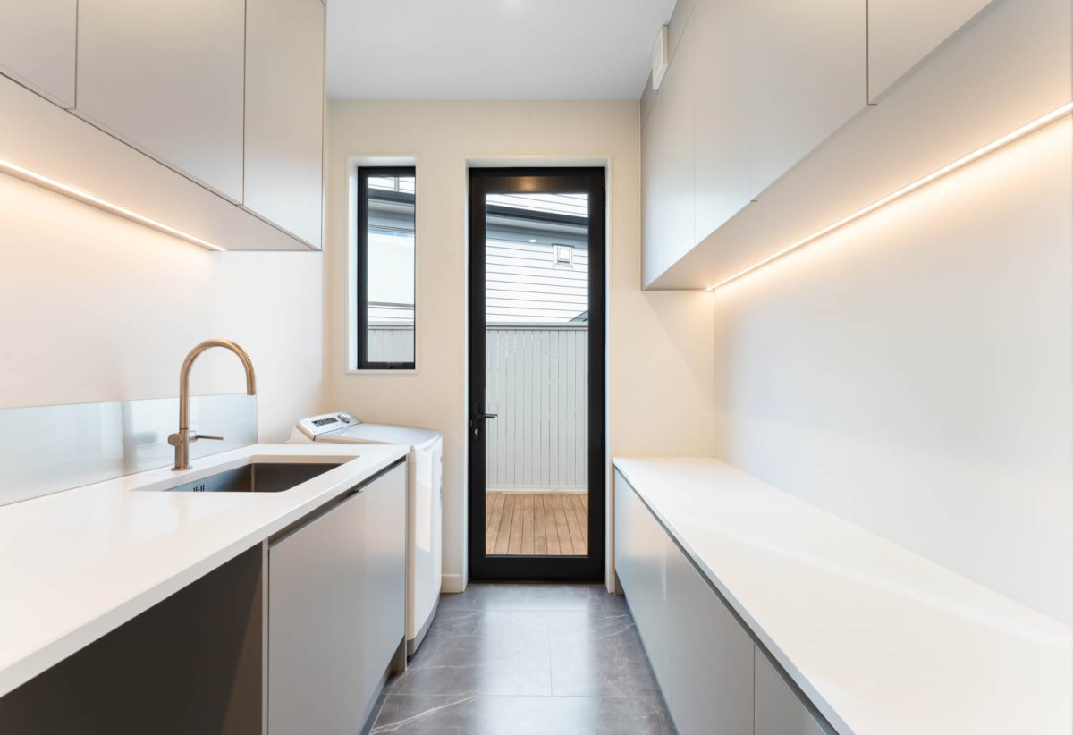 Rangitoto College zone, 502m2 section, 502m2 Floor area, 2 kitchens, 5 beds + 2 office room 4.5 baths house with double garage, Located on the basement level, the private gym is complete with a large mirrored feature wall , 18 Hooten Place, Oteha, Auckland