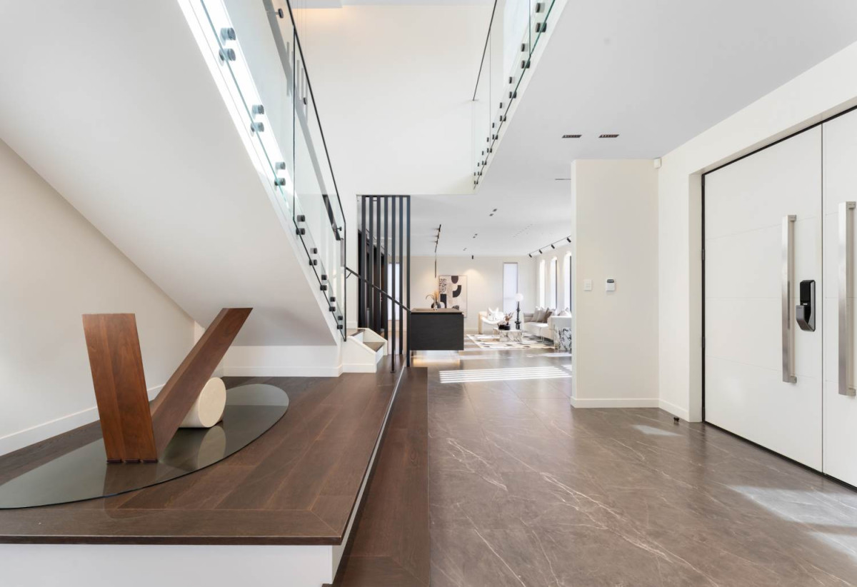 Rangitoto College zone, 502m2 section, 502m2 Floor area, 2 kitchens, 5 beds + 2 office room 4.5 baths house with double garage, Located on the basement level, the private gym is complete with a large mirrored feature wall , 18 Hooten Place, Oteha, Auckland