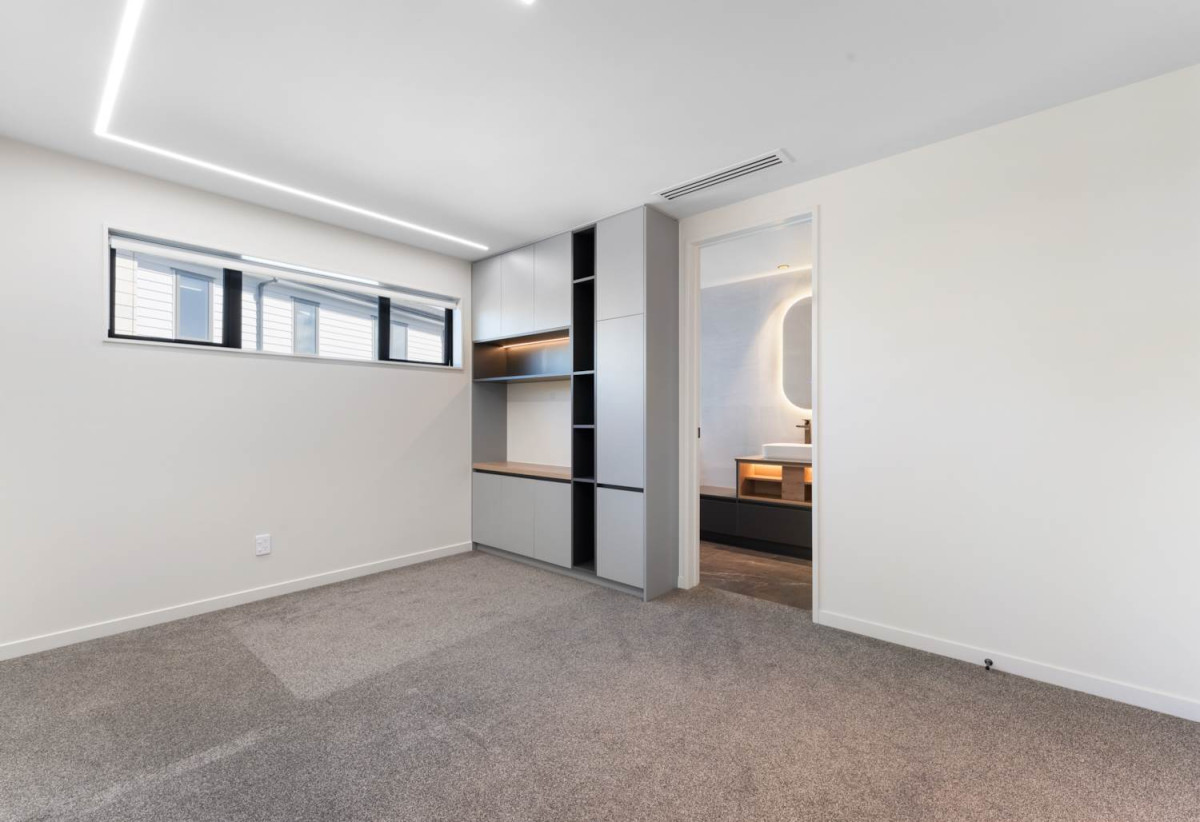 Rangitoto College zone, 502m2 section, 502m2 Floor area, 2 kitchens, 5 beds + 2 office room 4.5 baths house with double garage, Located on the basement level, the private gym is complete with a large mirrored feature wall , 18 Hooten Place, Oteha, Auckland
