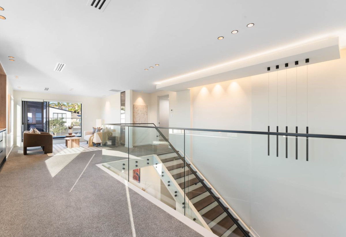 Rangitoto College zone, 502m2 section, 502m2 Floor area, 2 kitchens, 5 beds + 2 office room 4.5 baths house with double garage, Located on the basement level, the private gym is complete with a large mirrored feature wall , 18 Hooten Place, Oteha, Auckland