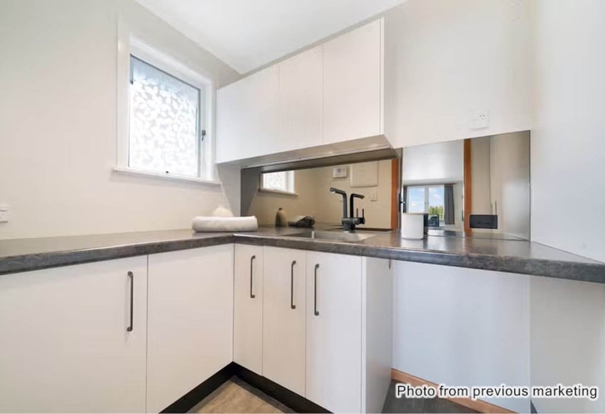 812m2 section, Six-Unit Development Site with Solid Rental Income, RC application in April 2025, The S92 response is expected soon. 3 beds 1 bath house is currently tenanted, and a substantial rear workshop with two separate rooms and three-phase, 34 Coniston Avenue, Te Atatu South, Auckland