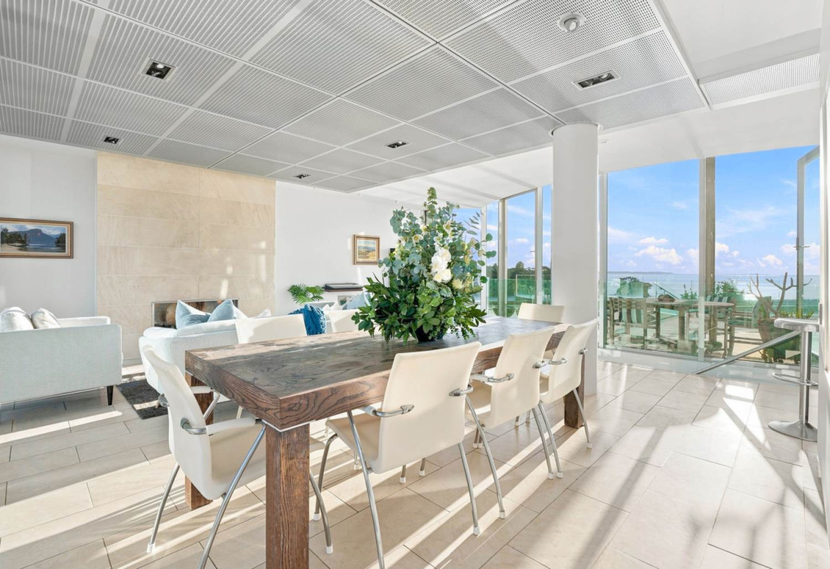 Just 160 metres from Waiake Beach, 1948m2 section, Built-in lift, 5 beds (5 ensuites) + office and wine room 6.5 baths house with 4 garage and the 18-metre cantilevered lap pool, 4 Sharon Road, Waiake, Auckland