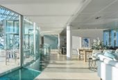 Just 160 metres from Waiake Beach, 1948m2 section, Built-in lift, 5 beds (5 ensuites) + office and wine room 6.5 baths house with 4 garage and the 18-metre cantilevered lap pool, 4 Sharon Road, Waiake, Auckland