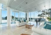 Just 160 metres from Waiake Beach, 1948m2 section, Built-in lift, 5 beds (5 ensuites) + office and wine room 6.5 baths house with 4 garage and the 18-metre cantilevered lap pool, 4 Sharon Road, Waiake, Auckland