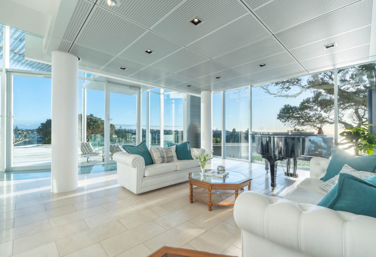 Just 160 metres from Waiake Beach, 1948m2 section, Built-in lift, 5 beds (5 ensuites) + office and wine room 6.5 baths house with 4 garage and the 18-metre cantilevered lap pool, 4 Sharon Road, Waiake, Auckland