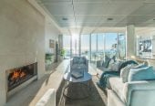 Just 160 metres from Waiake Beach, 1948m2 section, Built-in lift, 5 beds (5 ensuites) + office and wine room 6.5 baths house with 4 garage and the 18-metre cantilevered lap pool, 4 Sharon Road, Waiake, Auckland