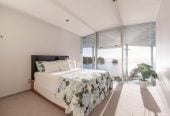 Just 160 metres from Waiake Beach, 1948m2 section, Built-in lift, 5 beds (5 ensuites) + office and wine room 6.5 baths house with 4 garage and the 18-metre cantilevered lap pool, 4 Sharon Road, Waiake, Auckland