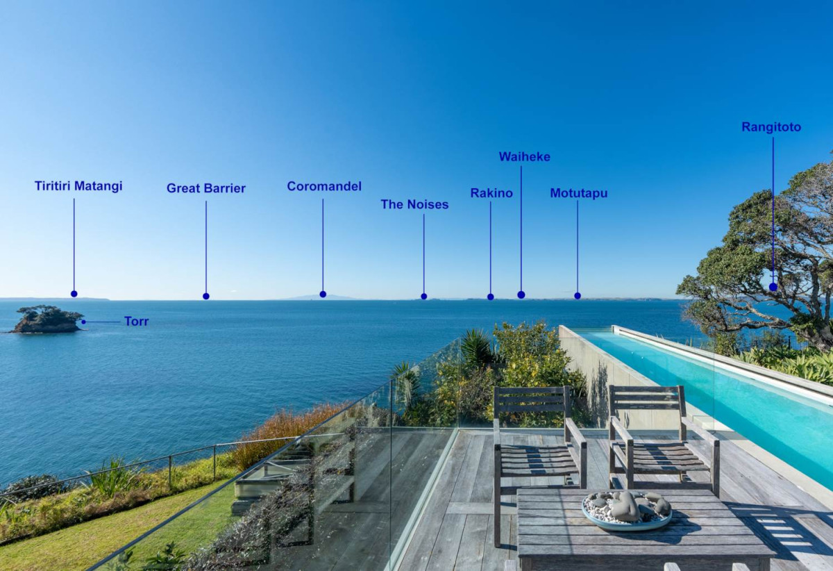 Just 160 metres from Waiake Beach, 1948m2 section, Built-in lift, 5 beds (5 ensuites) + office and wine room 6.5 baths house with 4 garage and the 18-metre cantilevered lap pool, 4 Sharon Road, Waiake, Auckland