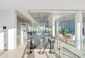 Just 160 metres from Waiake Beach, 1948m2 section, Built-in lift, 5 beds (5 ensuites) + office and wine room 6.5 baths house with 4 garage and the 18-metre cantilevered lap pool, 4 Sharon Road, Waiake, Auckland