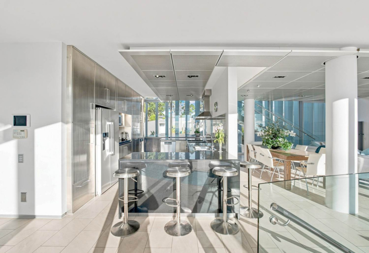 Just 160 metres from Waiake Beach, 1948m2 section, Built-in lift, 5 beds (5 ensuites) + office and wine room 6.5 baths house with 4 garage and the 18-metre cantilevered lap pool, 4 Sharon Road, Waiake, Auckland