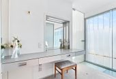 Just 160 metres from Waiake Beach, 1948m2 section, Built-in lift, 5 beds (5 ensuites) + office and wine room 6.5 baths house with 4 garage and the 18-metre cantilevered lap pool, 4 Sharon Road, Waiake, Auckland